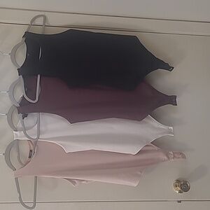 Bundle of 4 Express Bodysuits.